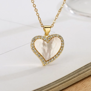 Elegant 18K gold-plated heart necklace with shell inlay and zircon accents on white background