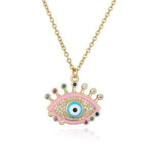 Detailed macro view of pink enamel evil eye pendant necklace with colorful zircons