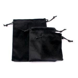 Detailed comparison of small, medium, and large black velvet drawstring pouches