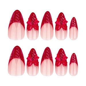 Red 3D textured French almond press-on nails with bow accents and sweater pattern