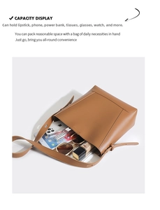 Top view of brown leather bucket bag showing large capacity with tablet and accessories