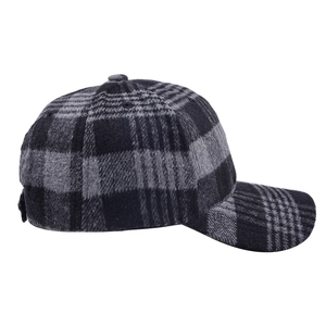 Detailed view of the black and gray plaid texture on this winter wool baseball cap