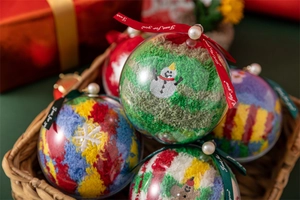 Christmas coral fleece socks in transparent ball gift box with elegant pearl ribbon