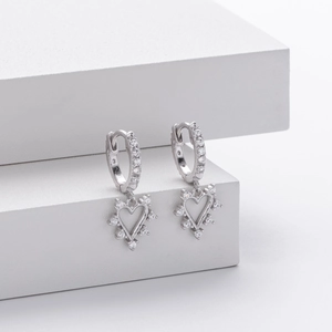 Elegant S925 sterling silver heart earrings with zircon stones on a white stand