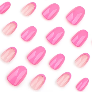 French rose pink short round press-on nails with gold glitter french tips design
