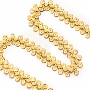 Detail of golden stainless steel daisy flower chain links for DIY jewelry making