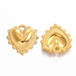 Macro detail of two golden heart charms with sunburst texture for DIY jewelry making