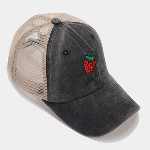 Detail of grey mesh baseball cap featuring a red strawberry embroidery on the front panel