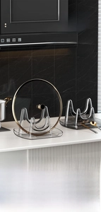 Detail of dark grey acrylic pot lid rack with U-shaped dual slots and water tray