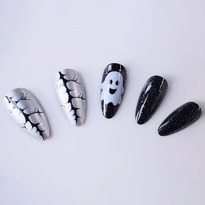 Ghost Halloween press-on nails with black crackle and silver glitter in almond shape