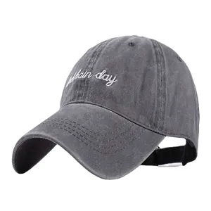 Casquette vintage en coton délavé anthracite avec broderie blanche Bad Hair Day