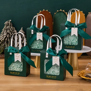 Dark green gift bag with transparent window, ribbon bow, and Thank You tag for packaging