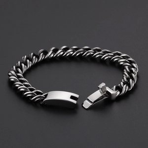 Rugged gunmetal titanium steel Cuban link bracelet with a secure fold-over clasp