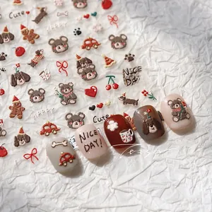 Macro view of 5D embossed nail stickers featuring cute cartoon bears and puppies