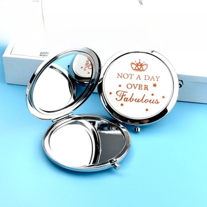Compact silver metal folding makeup mirror with Not A Day Over Fabulous print