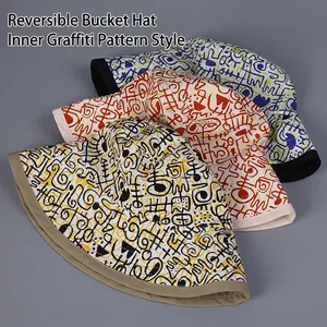 Waterproof reversible nylon bucket hat with artistic graffiti print for women outdoors