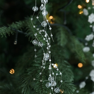 Transparent crystal bead garland for Christmas tree decoration with elegant bokeh light effect