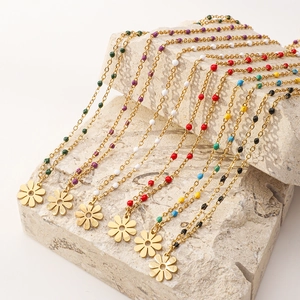 Bohemian gold stainless steel necklace with colorful beads and daisy flower pendant