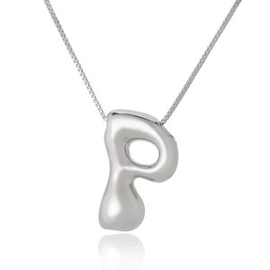 Macro shot of a silver 3D bubble letter P pendant with a shiny metallic finish on cross chain
