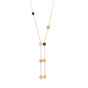 Gold Y-shaped Lariat necklace with black and white heart pendants on white background
