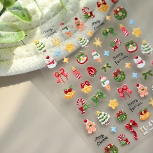 3D Christmas embossed nail art stickers with snowman and bow tie holiday patterns