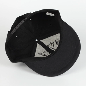 Detail view of cotton snapback hat interior with black abstract pattern and sweatband