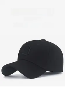 Detail of gothic D letter embroidery on black elastic stretch-fit baseball cap