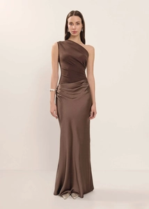 Detailed close-up of ruched waist design on a brown satin one-shoulder maxi dress
