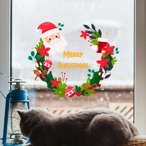 Merry Christmas window sticker featuring Santa Claus and a wreath for festive home decor