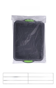 Detailed view of rectangular grey silicone brownie pan with green non-slip handles