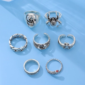7-piece gothic ring set in antique silver with spider, bat, and skull punk designs