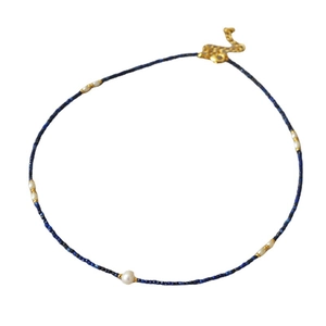 Minimalist lapis lazuli and freshwater pearl beaded necklace with gold accents and clasp