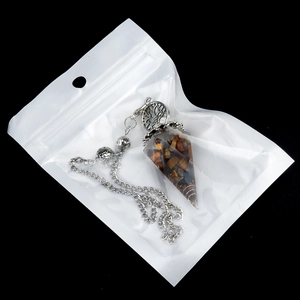 Tree of Life resin pendulum with tiger eye gravel stones and silver metal chain