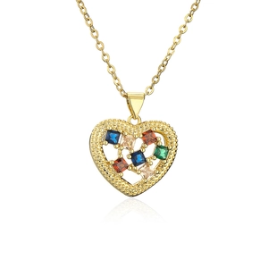 Gold plated heart pendant necklace with colorful square stones on white background