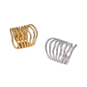 Polished gold and silver spiral stacked rings with hammer texture and wave design