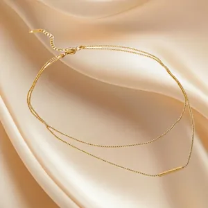 Classic double layer T-bar necklace with 18K gold plating on elegant champagne satin