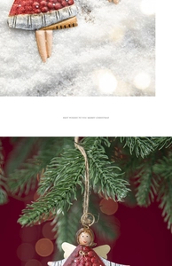 Detail view of retro metal angel ornament hanging on a Christmas tree branch