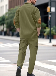 Rear view of men's olive green corduroy tracksuit set with camel elbow patches