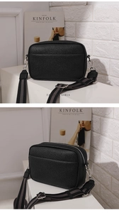 Detail of black pebble grain PU leather camera bag with a wide striped canvas strap