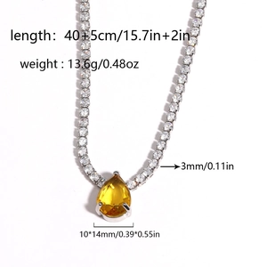 Detail showing yellow pear-shaped zircon necklace with 3mm tennis chain and 40+5cm size specs