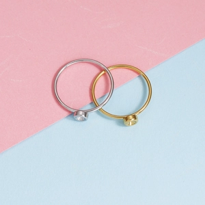 Polished stainless steel DIY birthstone rings in gold and silver finish with bezel base