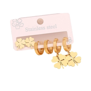 Golden stainless steel clover earring set featuring stud and drop earrings on a card