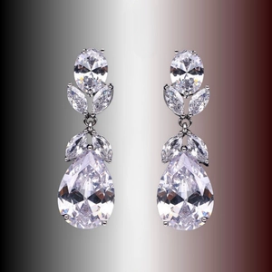Detailed view of silver-toned drop earrings featuring AAA teardrop and marquise cut cubic zirconia