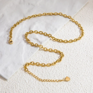 Detailed macro of 18k gold plated stainless steel cable chain with a heart charm detail