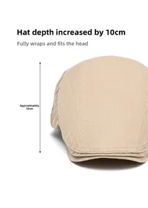 Detail of khaki cotton newsboy cap showing a 10cm deep fit for full head coverage