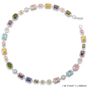 Detail of luxury choker necklace with multi-color gemstones and diamond halo setting