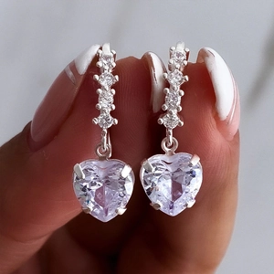 Detailed macro view of heart-cut lavender crystal earrings with S925 silver and zircons