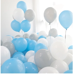 Detail of matte sky blue and grey latex balloons in a stylish decorative arch arrangement