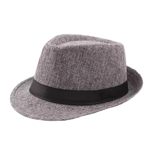 Detail shot of a grey Panama fedora hat with a black ribbon band and woven texture