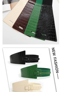 Detail of 8cm wide corset belts in crocodile texture with elastic bands and buckles